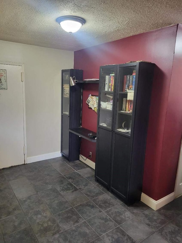 61 Bronx River Rd Unit 8E, Yonkers, NY 10704 - interior space with a textured ceiling and baseboards