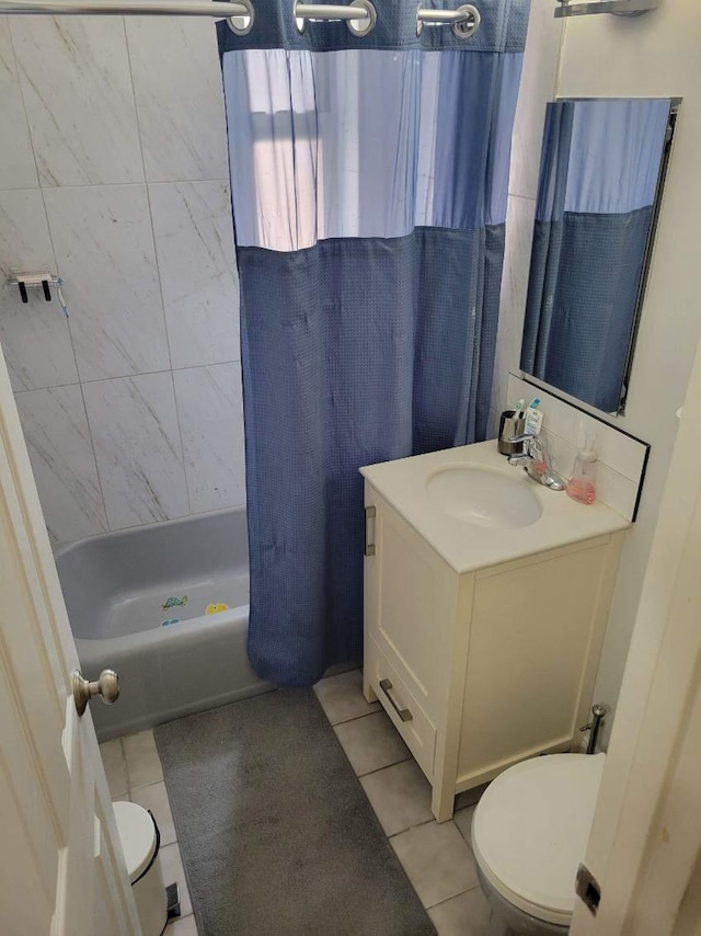 61 Bronx River Rd Unit 8E, Yonkers, NY 10704 - bathroom featuring tile patterned floors, vanity, and shower / tub combo