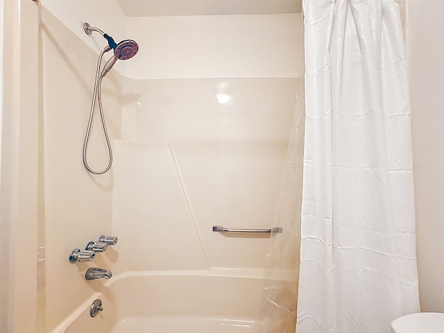 24 Lakeview Ter, Monticello, NY 12701 - full bathroom with shower / tub combo with curtain and toilet