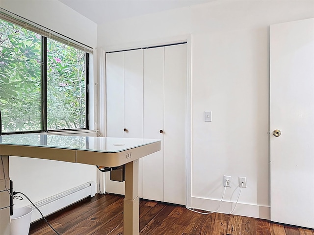 24 Lakeview Ter, Monticello, NY 12701 - unfurnished office featuring baseboard heating and dark wood-type flooring