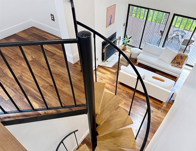 24 Lakeview Ter, Monticello, NY 12701 - stairway with baseboards and wood finished floors