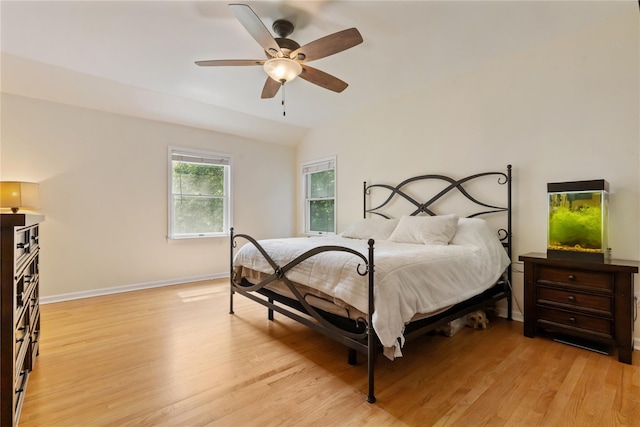 41 Indian Hill Rd, Brewster, NY 10509 - bedroom with light wood-type flooring, vaulted ceiling, and a ceiling fan