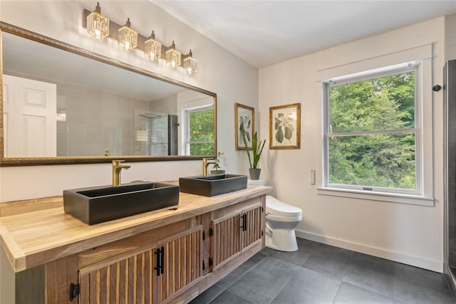41 Indian Hill Rd, Brewster, NY 10509 - bathroom featuring plenty of natural light, double vanity, and a stall shower