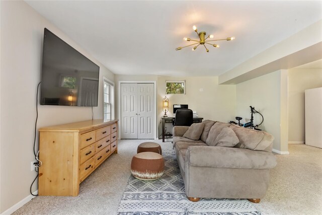 41 Indian Hill Rd, Brewster, NY 10509 - living room with an office area, light carpet, a chandelier, and healthy amount of natural light