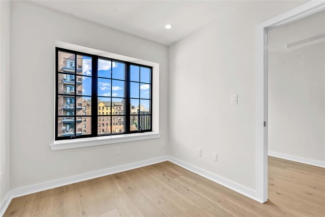 25-25 31st Ave Unit 4B, Astoria, NY 11106 - spare room featuring light wood-type flooring, baseboards, and recessed lighting