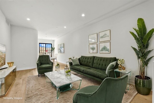 25-25 31st Ave Unit 4B, Astoria, NY 11106 - living area featuring light wood finished floors, recessed lighting, and baseboards