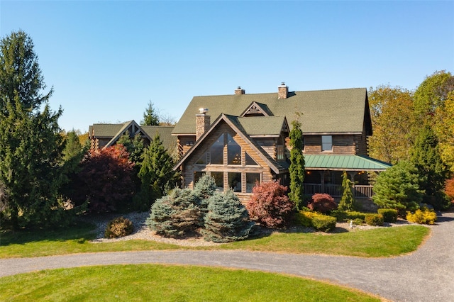 53 Vista Ln, Port Jervis, NY 12771 - log-style house with a chimney, a standing seam roof, a front yard, and metal roof