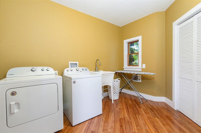 53 Vista Ln, Port Jervis, NY 12771 - laundry area with independent washer and dryer, light wood-style floors, and baseboards