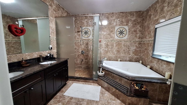 32-37 214th Sts, Bayside, NY 11361 - bathroom featuring tile walls, a tub with jets, a stall shower, and double vanity