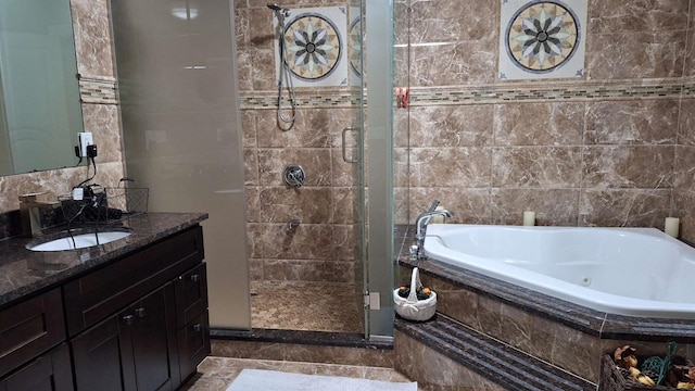 32-37 214th Sts, Bayside, NY 11361 - bathroom featuring a shower stall, vanity, a tub with jets, tile walls, and marble finish floors