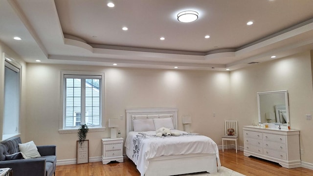 32-37 214th Sts, Bayside, NY 11361 - bedroom with a raised ceiling, wood finished floors, and recessed lighting