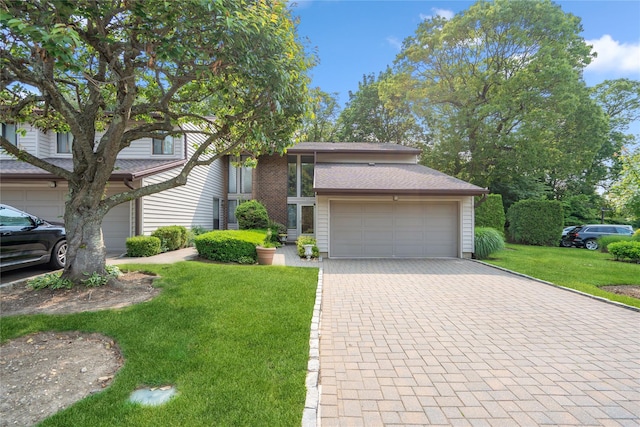 55 Maple Run Dr, Jericho, NY 11753 - view of front of property featuring decorative driveway, a front lawn, and a garage