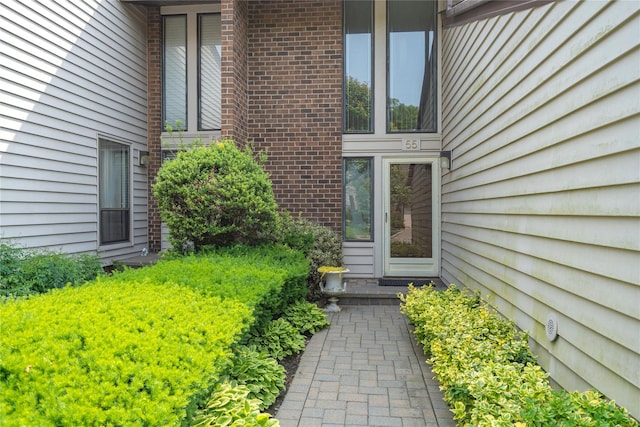 55 Maple Run Dr, Jericho, NY 11753 - entrance to property featuring brick siding