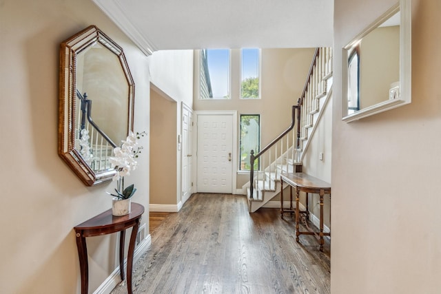 55 Maple Run Dr, Jericho, NY 11753 - entryway with stairway and wood finished floors