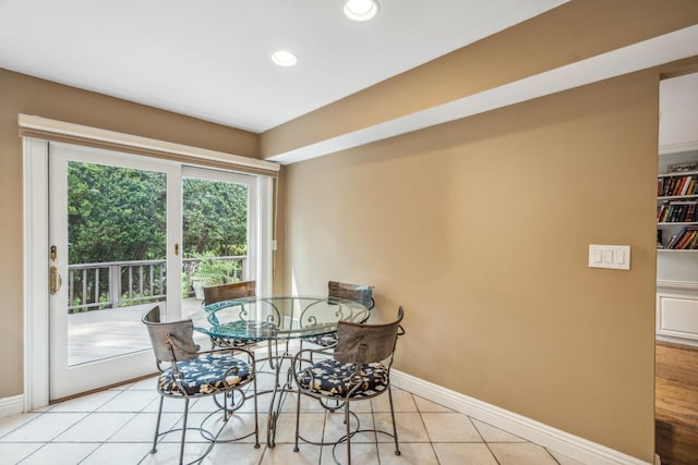 55 Maple Run Dr, Jericho, NY 11753 - dining area with light tile patterned floors and recessed lighting