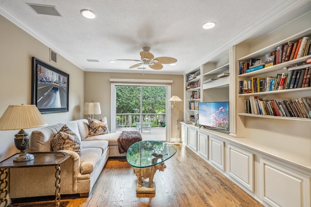 55 Maple Run Dr, Jericho, NY 11753 - living room with a textured ceiling, crown molding, ceiling fan, light wood-type flooring, and recessed lighting