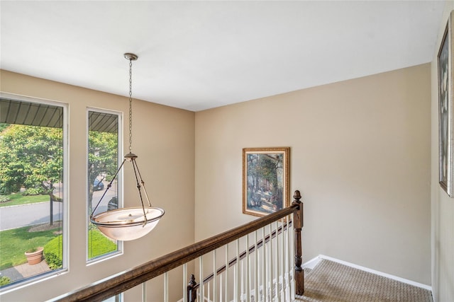 55 Maple Run Dr, Jericho, NY 11753 - hall with an upstairs landing and carpet floors