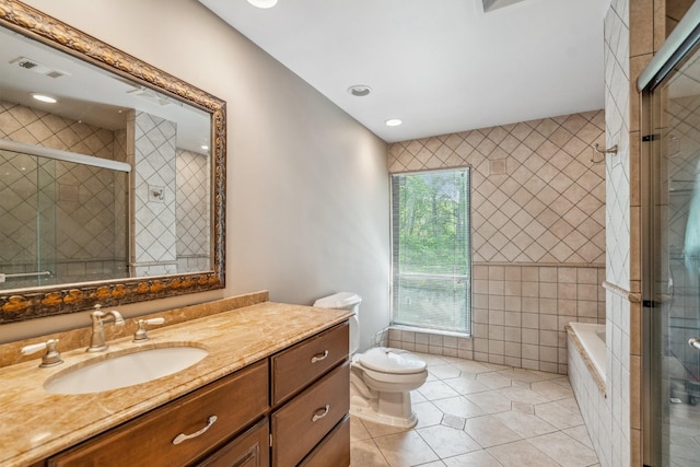 55 Maple Run Dr, Jericho, NY 11753 - bathroom with vanity, tile walls, tile patterned floors, a shower stall, and a bath