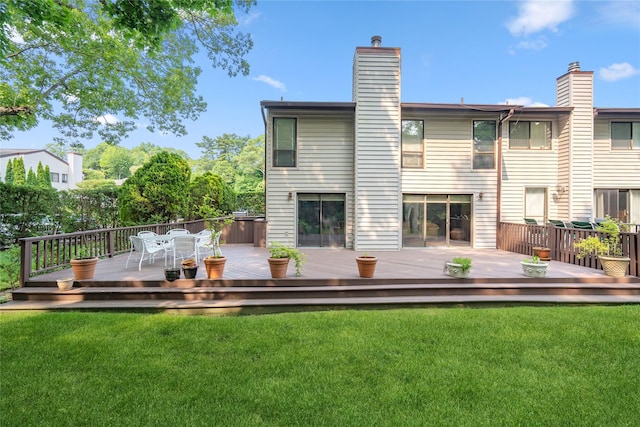 55 Maple Run Dr, Jericho, NY 11753 - back of house featuring outdoor dining area, a chimney, a yard, and a wooden deck