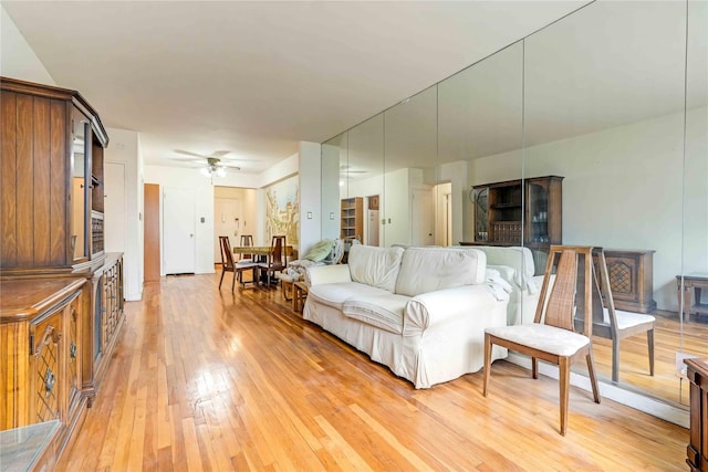 25-11 Union St Unit 2G, Flushing, NY 11354 - living area with light wood-style flooring and a ceiling fan