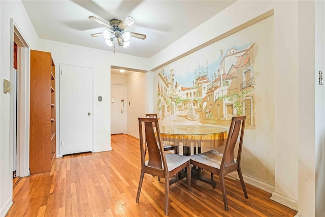 25-11 Union St Unit 2G, Flushing, NY 11354 - dining area with ceiling fan, light wood-style flooring, and baseboards