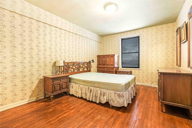 25-11 Union St Unit 2G, Flushing, NY 11354 - bedroom with dark wood-type flooring