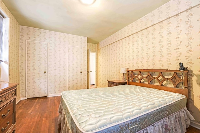 25-11 Union St Unit 2G, Flushing, NY 11354 - bedroom with dark wood-type flooring and wallpapered walls