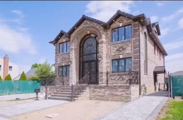24-11 157th St, Whitestone, NY 11357 - view of front of home featuring brick siding