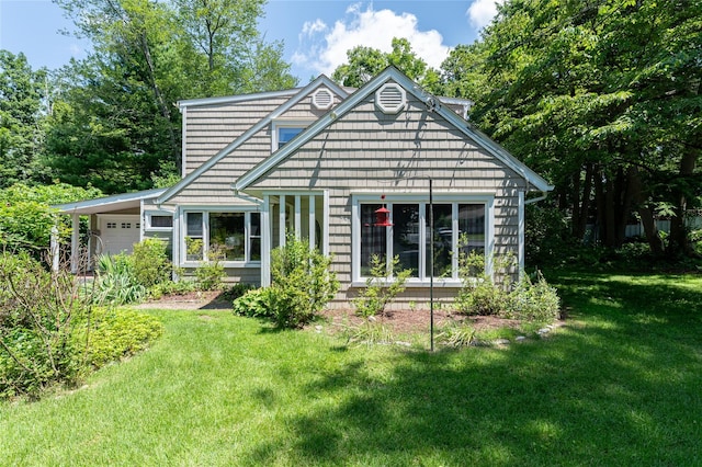 94 E Way, Mount Kisco, NY 10549 - back of property with an attached garage and a lawn