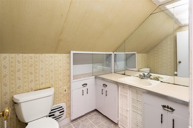 94 E Way, Mount Kisco, NY 10549 - bathroom featuring wallpapered walls, vanity, vaulted ceiling, and a baseboard heating unit
