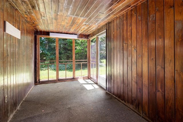 94 E Way, Mount Kisco, NY 10549 - unfurnished sunroom featuring wooden walls, wood ceiling, and carpet floors