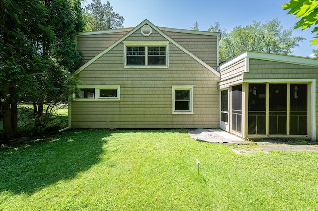 94 E Way, Mount Kisco, NY 10549 - back of property with a sunroom and a yard