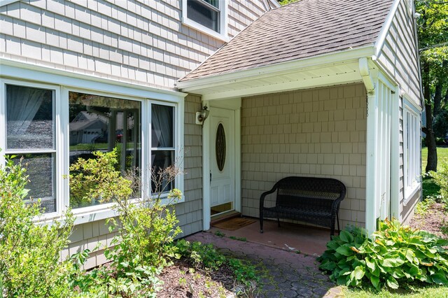 94 E Way, Mount Kisco, NY 10549 - doorway to property with a shingled roof