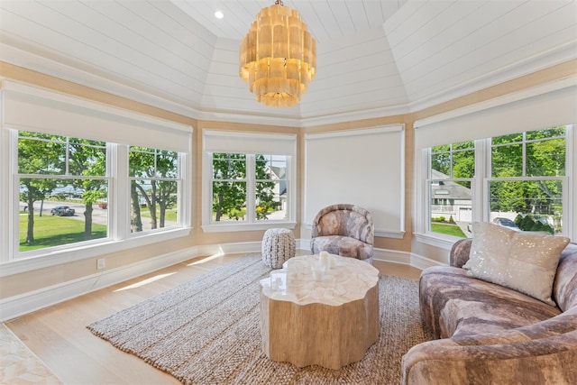 41 Landing Ln, East Quogue, NY 11942 - sunroom / solarium with wood finished floors, baseboards, and a towering ceiling