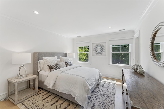 41 Landing Ln, East Quogue, NY 11942 - bedroom featuring ornamental molding, light wood-style flooring, recessed lighting, and baseboards