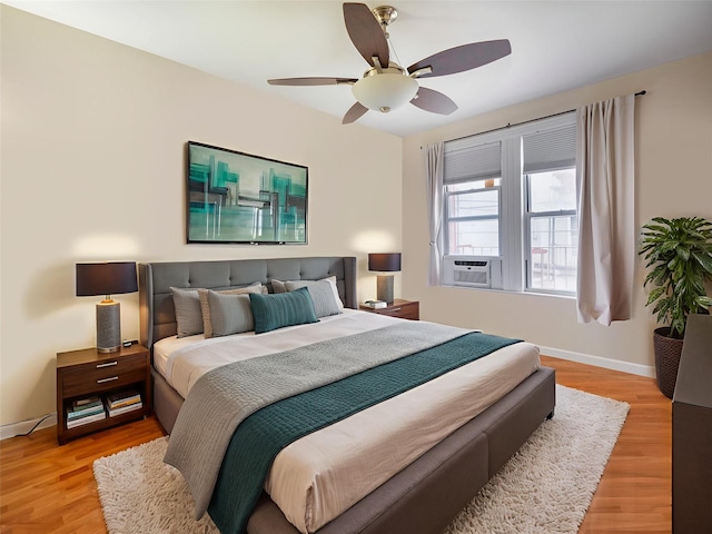 1840 21st Dr, Astoria, NY 11105 - bedroom featuring light wood-type flooring, baseboards, and cooling unit