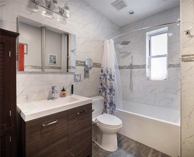 1840 21st Dr, Astoria, NY 11105 - full bath with vanity, tile walls, toilet, shower / bath combo, and wood finished floors