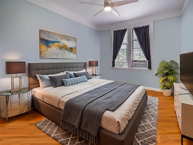 1840 21st Dr, Astoria, NY 11105 - bedroom featuring light wood-type flooring, ceiling fan, and baseboards