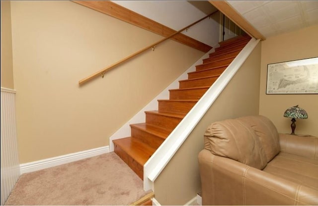 18 Chaucer Cir, Baldwinsville, NY 13027 - staircase featuring baseboards and carpet