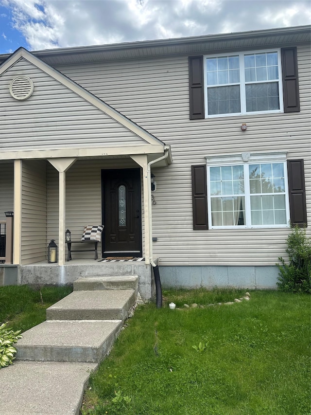 36 Marian Ct, Warwick, NY 10990 - view of front facade with a front lawn and covered porch