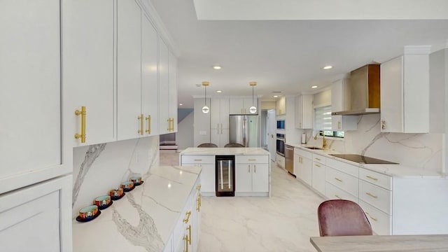 14 Acorn Ponds Dr Unit 14, Roslyn, NY 11576 - kitchen featuring wine cooler, stainless steel appliances, wall chimney range hood, white cabinets, and recessed lighting