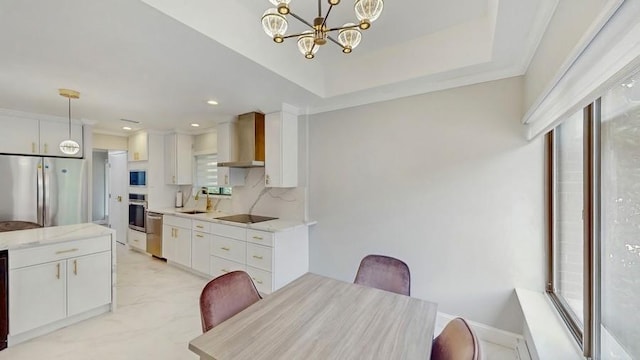 14 Acorn Ponds Dr Unit 14, Roslyn, NY 11576 - dining area featuring a chandelier and recessed lighting