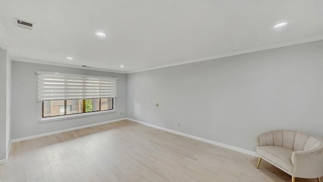 14 Acorn Ponds Dr Unit 14, Roslyn, NY 11576 - unfurnished room featuring ornamental molding, light wood finished floors, baseboards, and recessed lighting