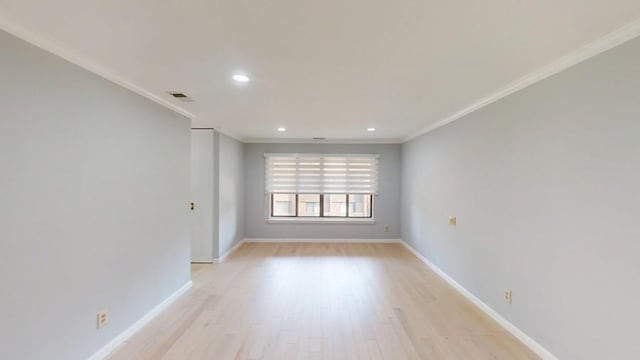 14 Acorn Ponds Dr Unit 14, Roslyn, NY 11576 - unfurnished room with light wood-style floors, crown molding, baseboards, and recessed lighting