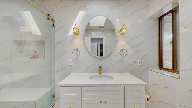 14 Acorn Ponds Dr Unit 14, Roslyn, NY 11576 - bathroom featuring vanity and tile walls