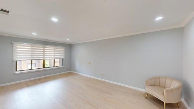 14 Acorn Ponds Dr Unit 14, Roslyn, NY 11576 - unfurnished room with crown molding, light wood-type flooring, baseboards, and recessed lighting
