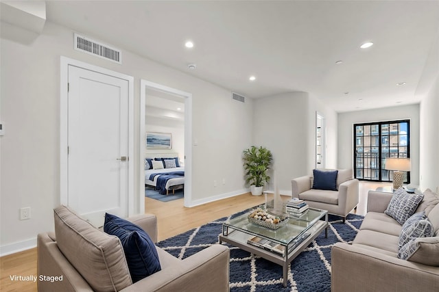 25-25 31st Ave Unit 6B, Astoria, NY 11106 - living area with light wood finished floors, recessed lighting, and baseboards