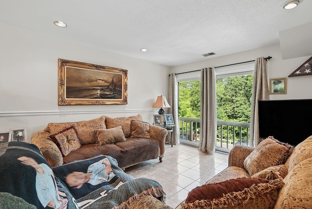 34 Overlook Commons, Yorktown Heights, NY 10598 - living area with light tile patterned floors, recessed lighting, and a textured ceiling