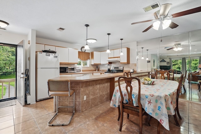 34 Overlook Commons, Yorktown Heights, NY 10598 - dining room featuring ceiling fan and light tile patterned flooring