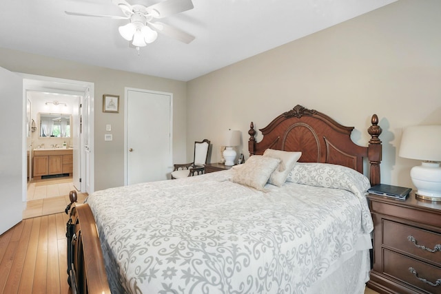 34 Overlook Commons, Yorktown Heights, NY 10598 - bedroom with light wood-type flooring, connected bathroom, and a ceiling fan